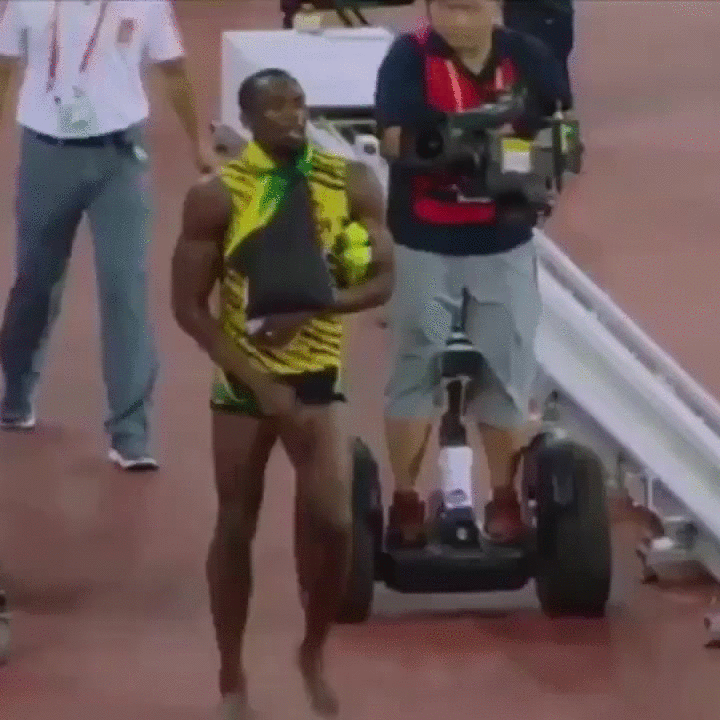 Usain Bolt gets taken out by cameraman